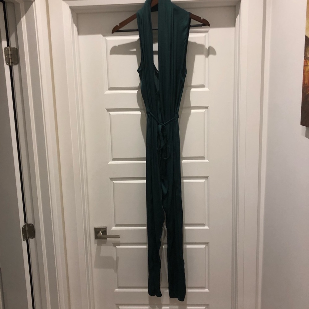Green silk jumpsuit in small Zara
